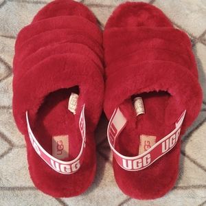 Fluffy red ugg slides with thick logo strap
